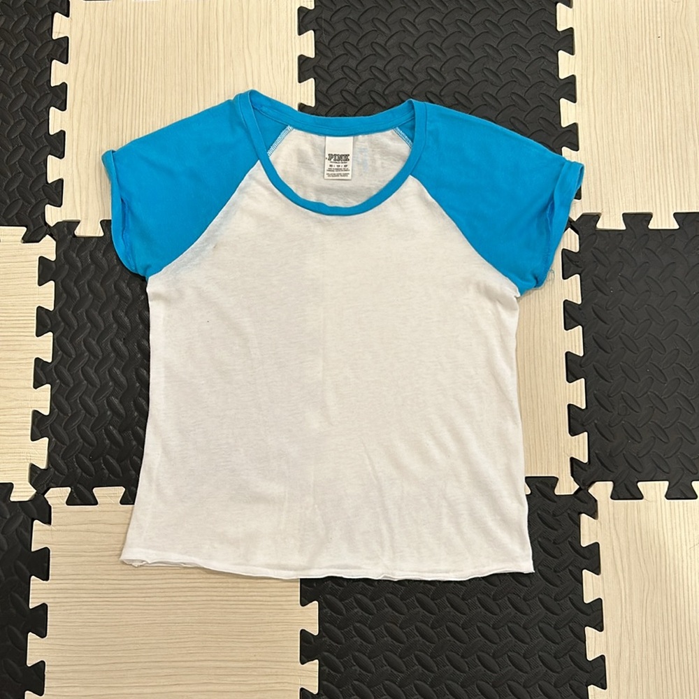 Pink Victoria’s Secret, white and blue baseball tea in size extra small